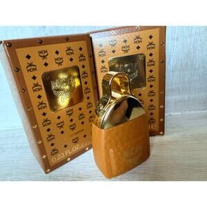 TWO MCM perfume dabbers